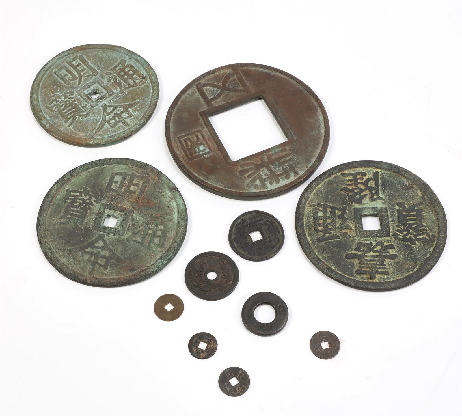 A GROUP OF ELEVEN ASIAN BRONZE