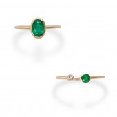 A GROUP OF EMERALD AND FOURTEE