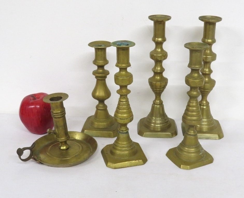 A GROUP OF ENGLISH BEEHIVE BRASS