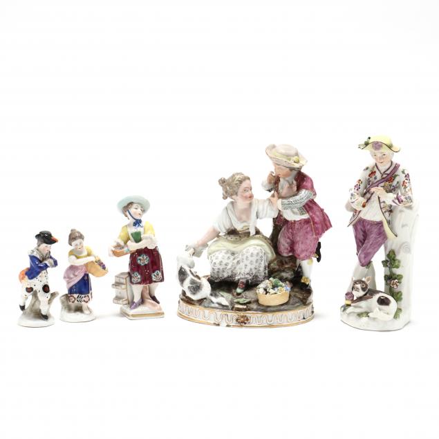 A GROUP OF FIVE ANTIQUE FIGURINES