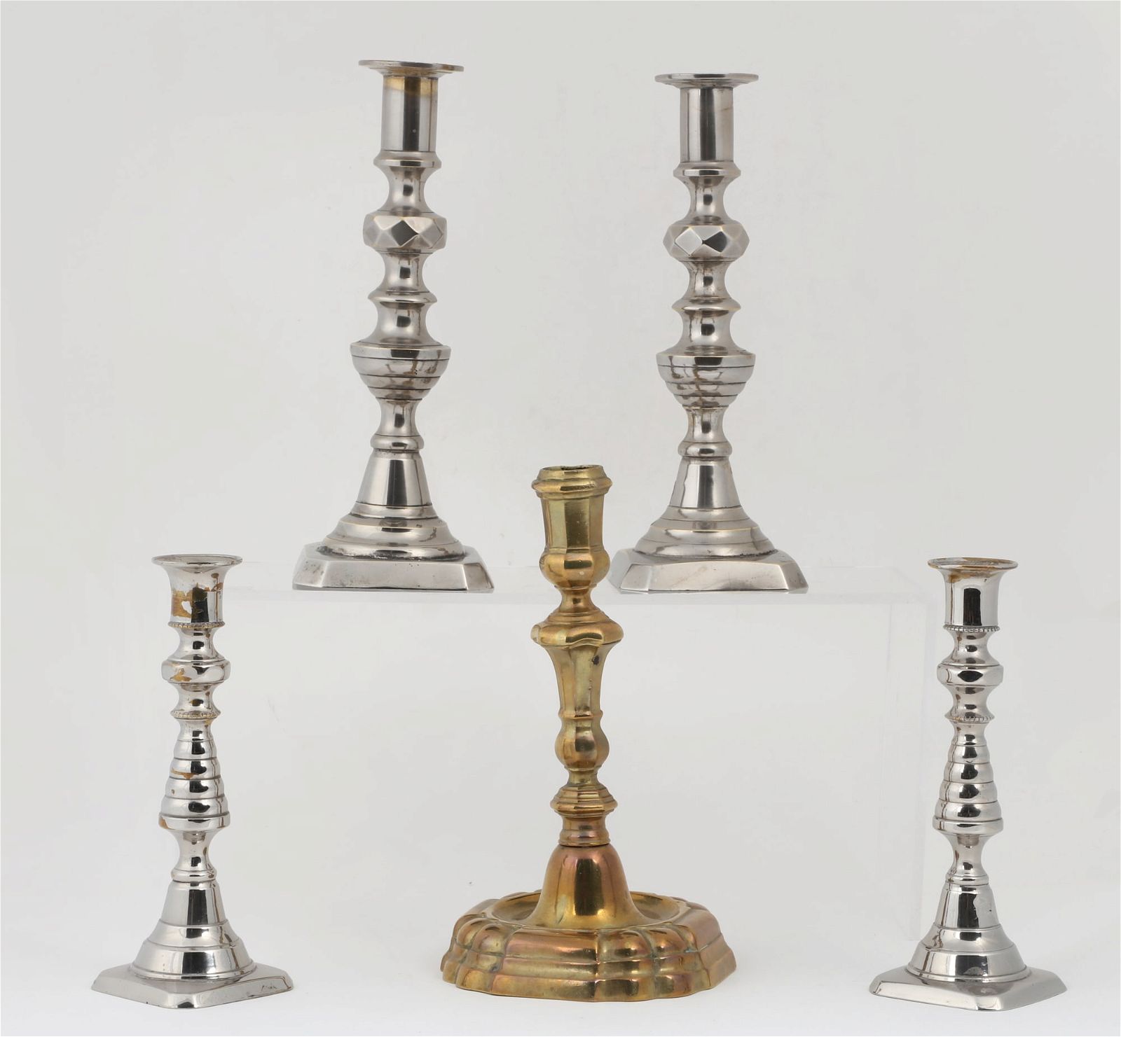 A GROUP OF FIVE BRASS AND METAL