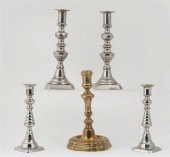 A GROUP OF FIVE BRASS AND META
