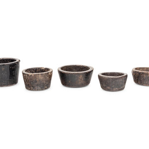 A Group of Five Carved Bowls and