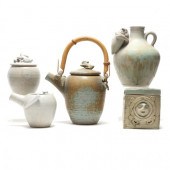 A GROUP OF FIVE PIECES BY TOM