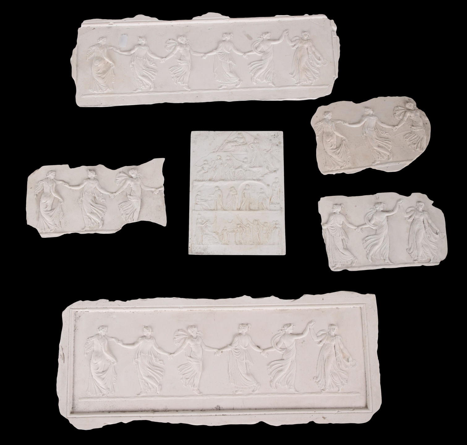 A GROUP OF FIVE PLASTER FRIEZE