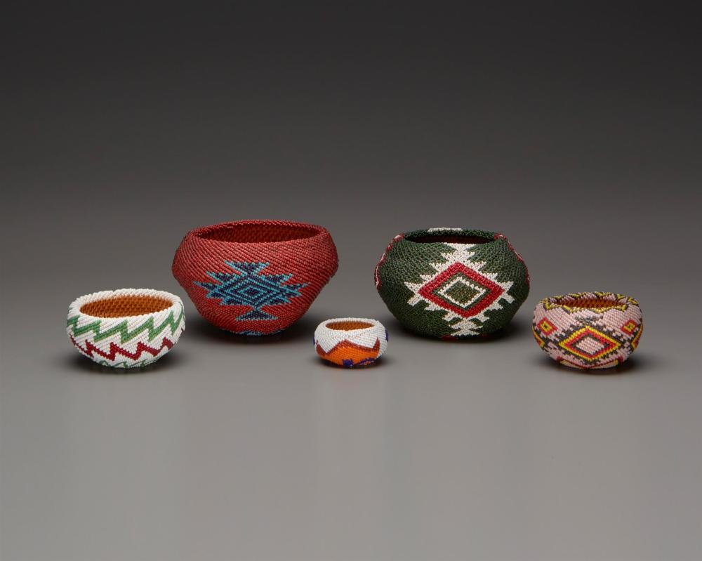 A GROUP OF FIVE SMALL WASHOE BEADED