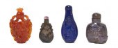 * A Group of Four Hardstone Sn