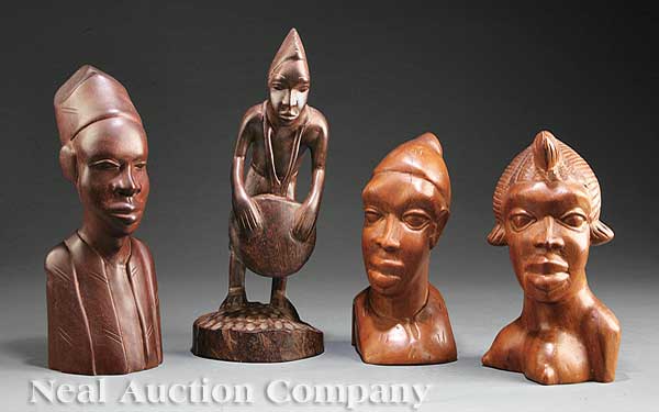 A Group of Four African Carved Wood