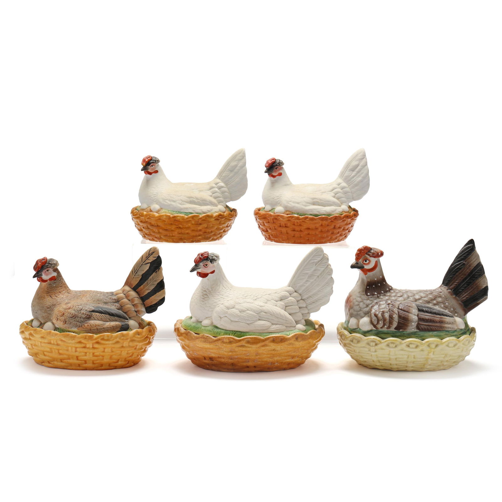 A GROUP OF FOUR BISQUE PORCELAIN