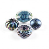A GROUP OF FOUR BLUE IRIDESCEN