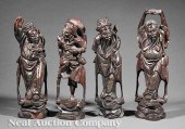 A Group of Four Chinese Carved