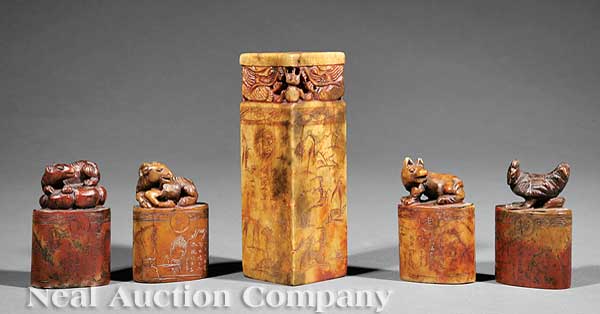 A Group of Four Chinese Carved