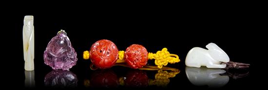 A Group of Four Chinese Toggles