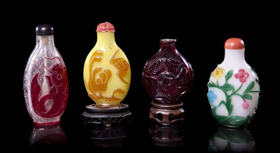*A Group of Four Glass Snuff