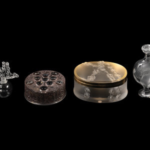 A Group of Four Lalique Dresser