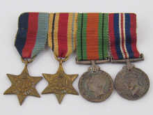 A group of four miniature second
