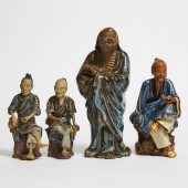 A Group of Four Shiwan Figures
