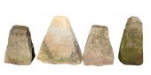 A GROUP OF FOUR STADDLE STONE