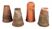 A GROUP OF FOUR TERRACOTTA RHU