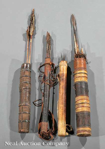 A Group of Four West African Carved