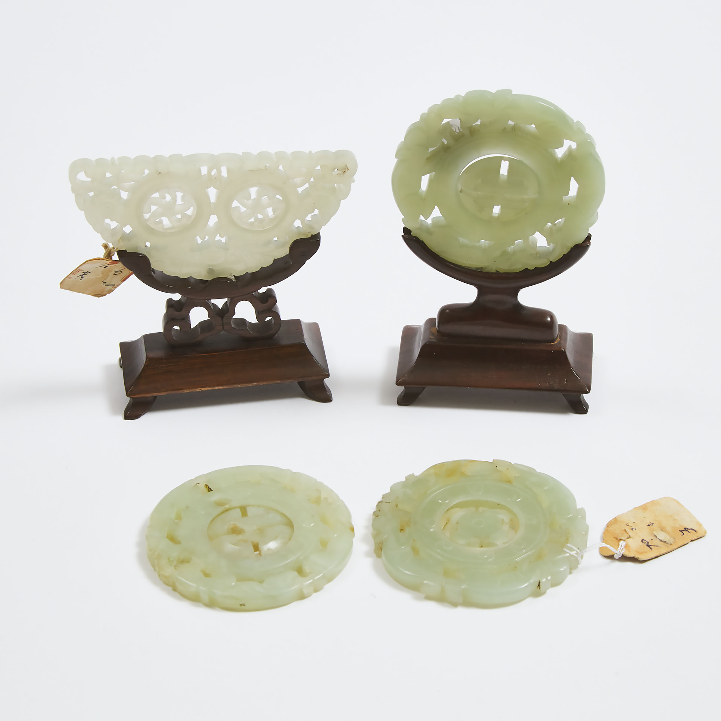 A Group of Four White Jade