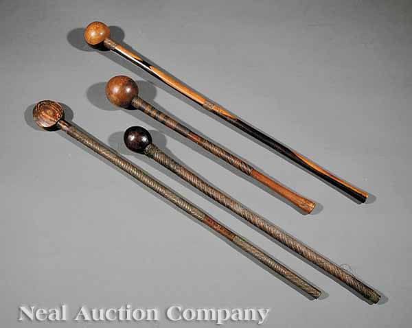 A Group of Four Zulu Carved Wood