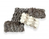 A GROUP OF FUR PILLOWSA group