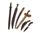 A GROUP OF KNIVES AND SWORDSA