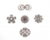 A GROUP OF LOS CASTILLO BROOCH