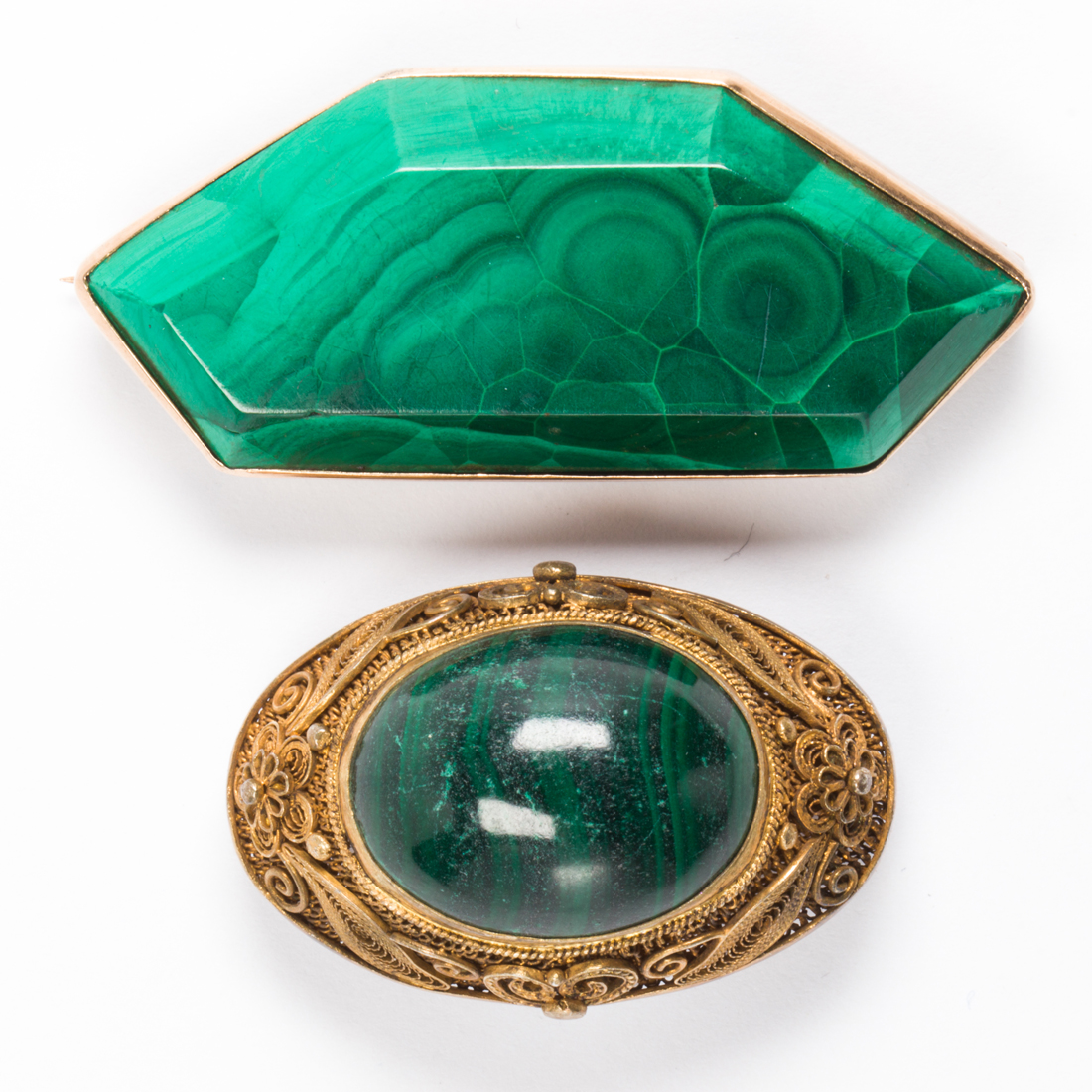 A GROUP OF MALACHITE BROOCHES A