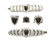 A GROUP OF MATL SILVER, ONYX,