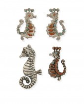 A GROUP OF MATL SILVER SEAHORS