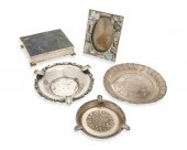 A GROUP OF METAL TABLE ITEMSA