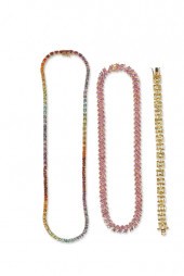 A GROUP OF MULTI-COLORED GEMST
