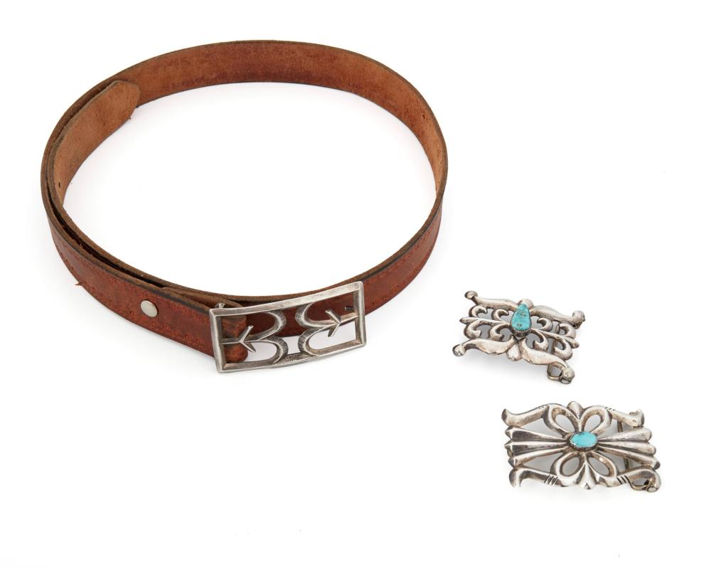 A GROUP OF NAVAJO SANDCAST BUCKLESA