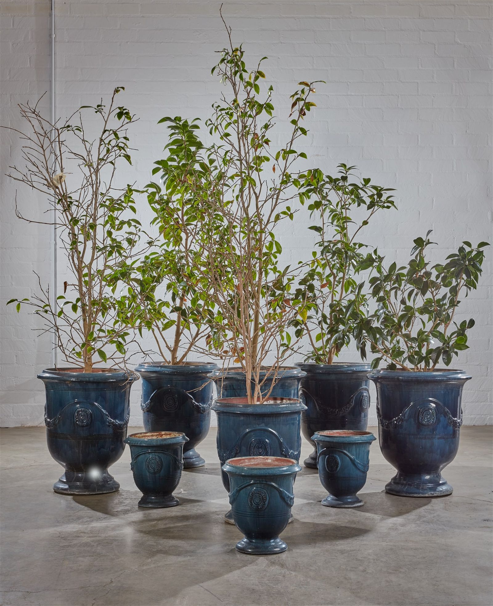 A GROUP OF NINE GLAZED