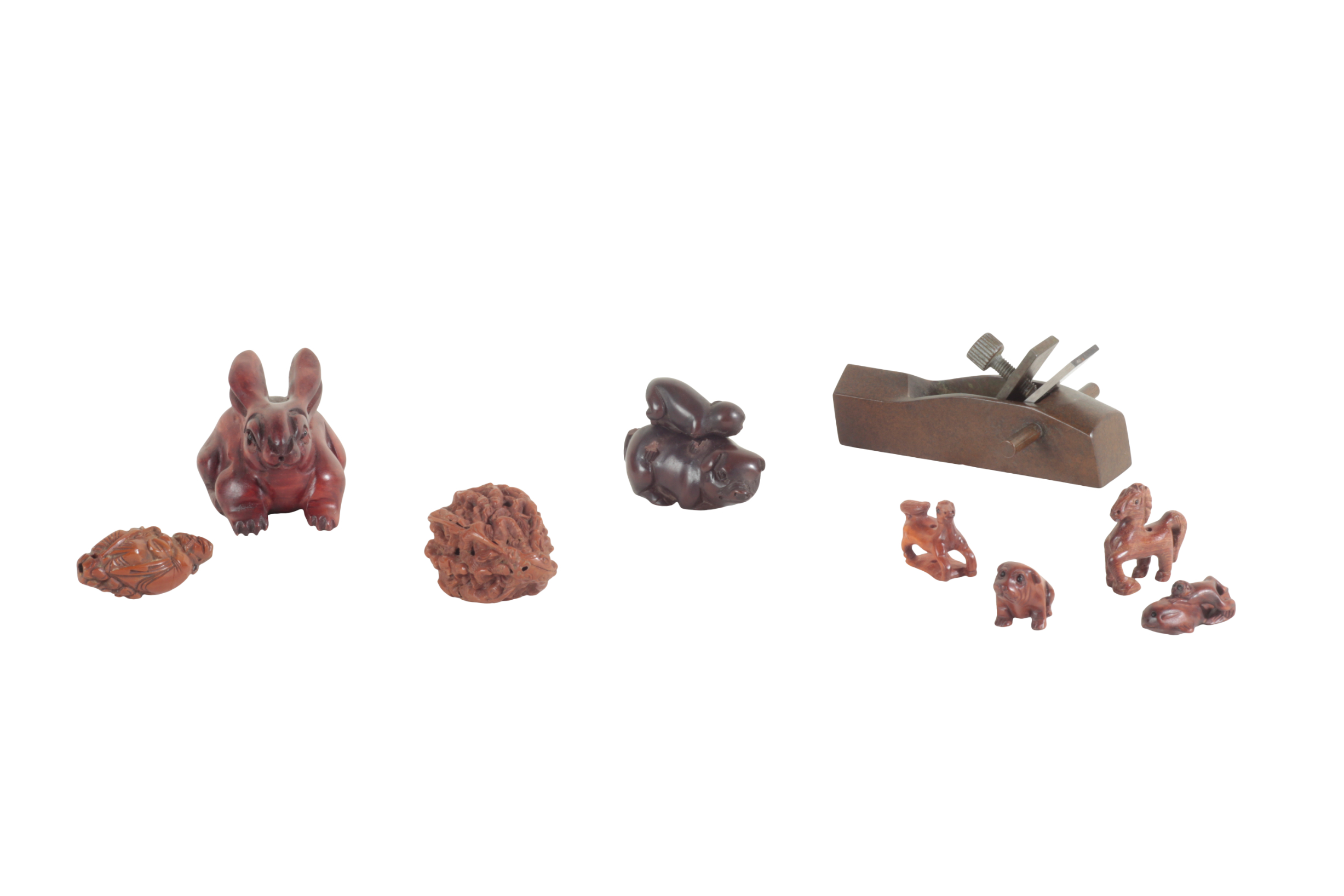 A GROUP OF NINE JAPANESE NETSUKE,