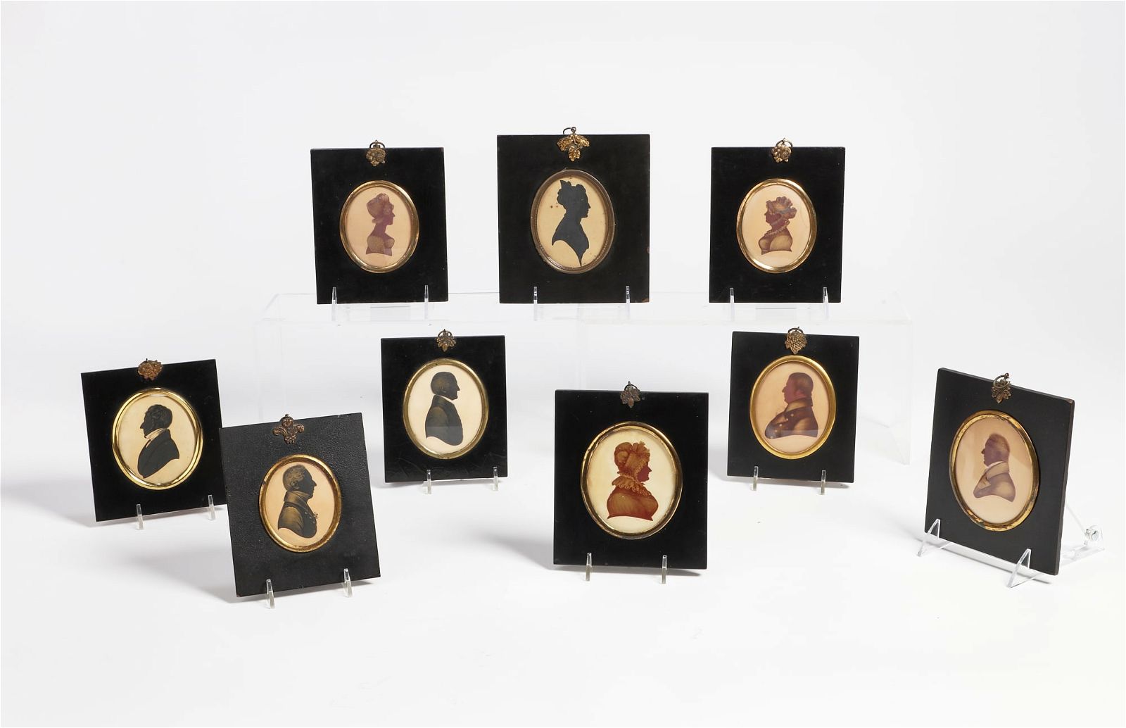 A GROUP OF NINE SILHOUETTESA