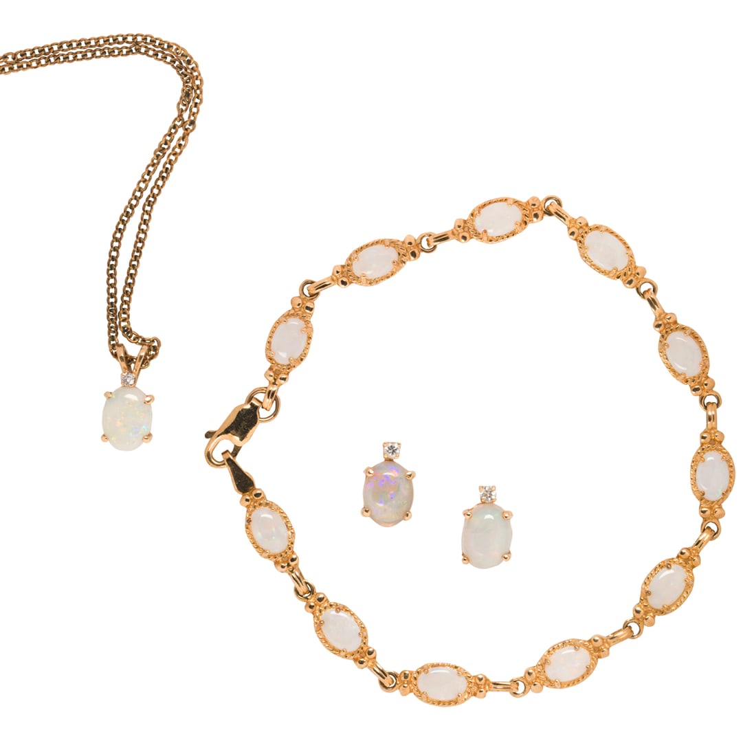 A GROUP OF OPAL, DIAMOND AND GOLD