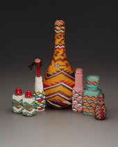 A GROUP OF PAIUTE BEADED BOTTL