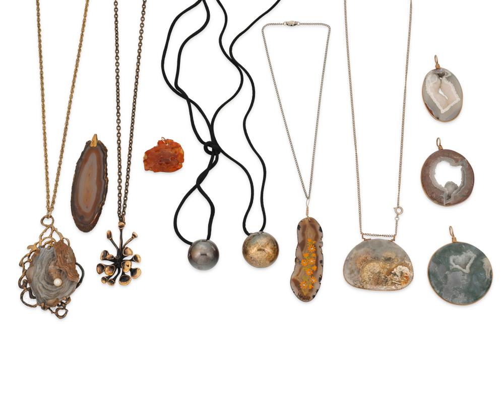 A GROUP OF PENDANTS INCLUDING