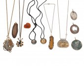 A GROUP OF PENDANTS INCLUDING