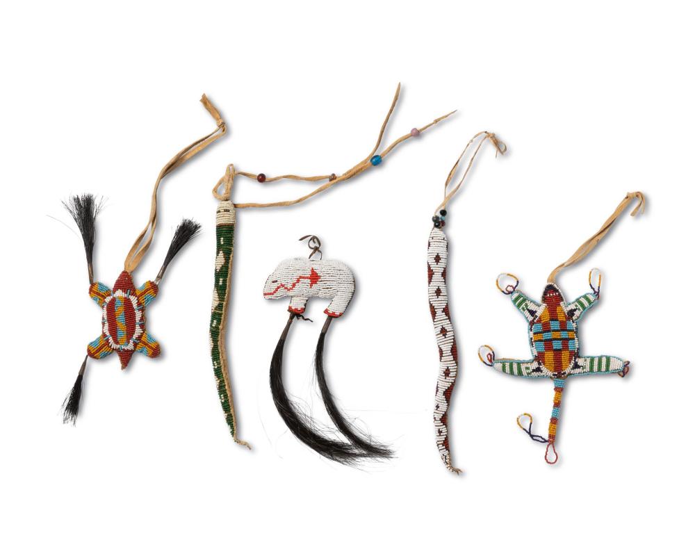 A GROUP OF PLAINS-STYLE BEADED