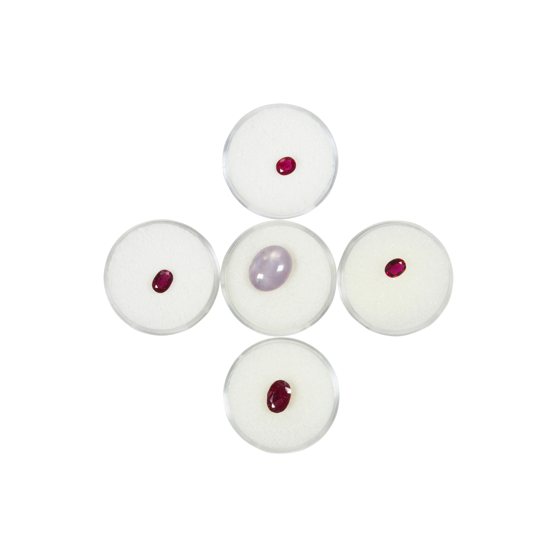 A GROUP OF RUBIES AND A SINGLE STAR