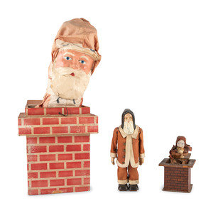 A Group of Santa Claus Figures Last