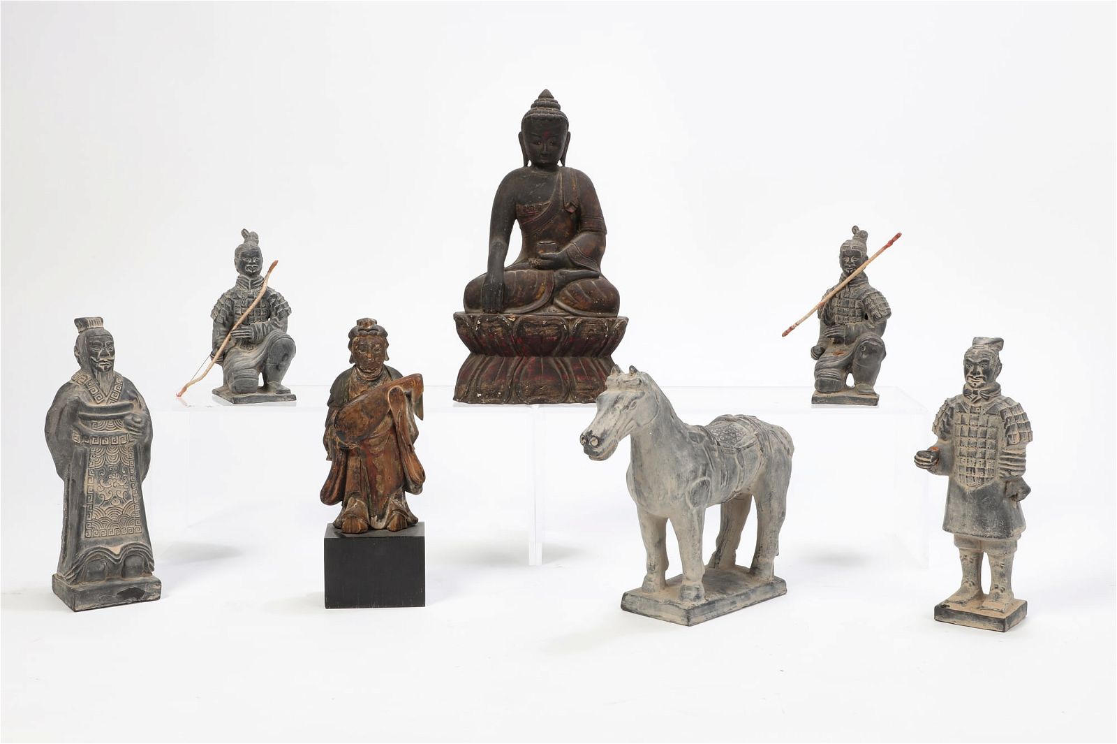 A GROUP OF SEVEN ASIAN FIGURESA