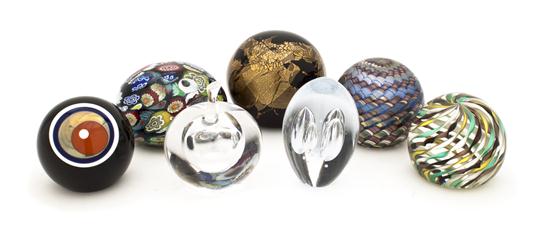 A Group of Seven Glass Paperweights