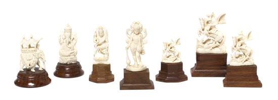 A Group of Seven Indian Carved