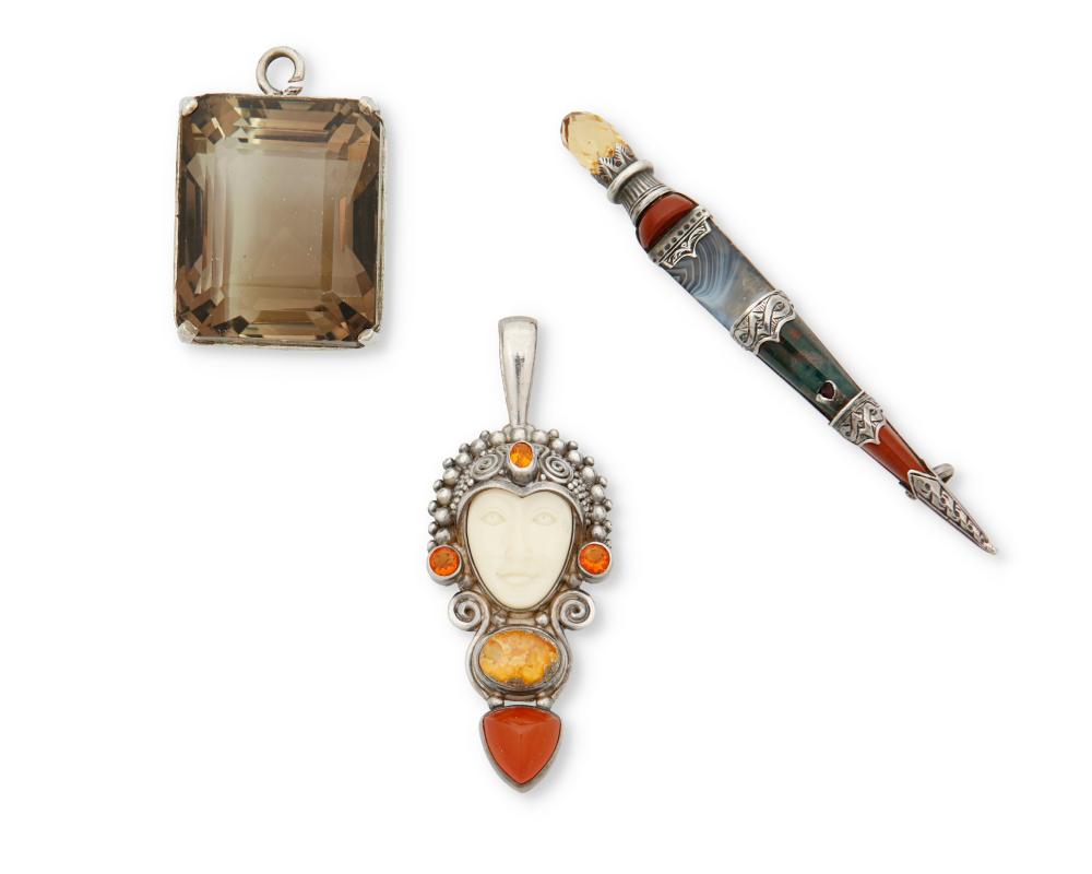 A GROUP OF SILVER AND SET STONE
