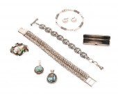 A GROUP OF SILVER AND STONE SE